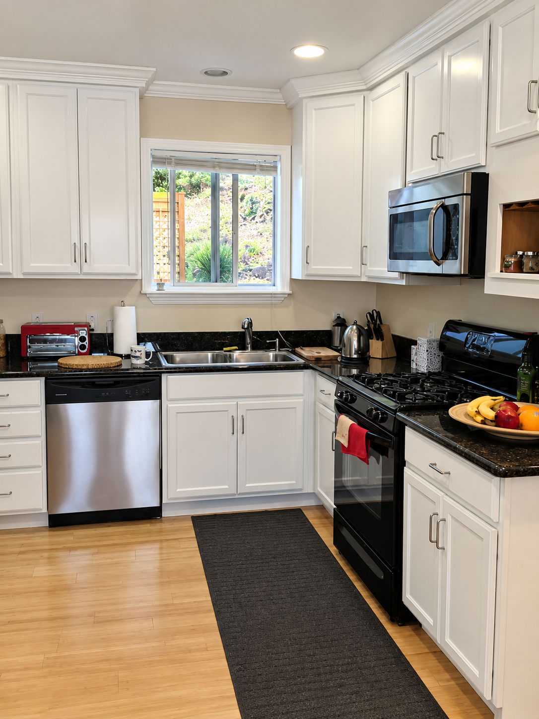 Completed white kitchen cabinet painting project